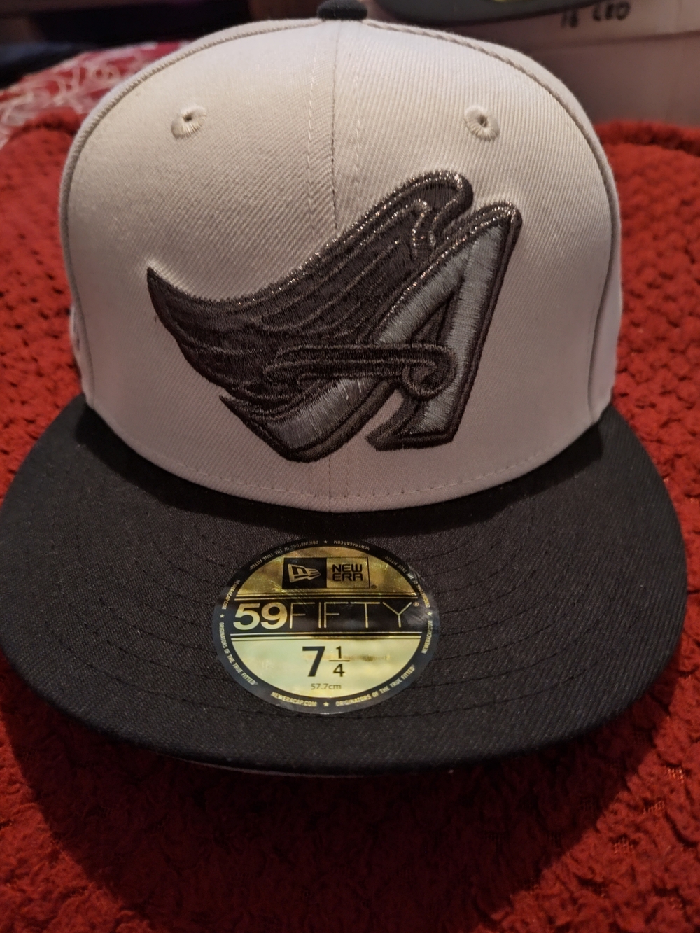New Era Two-Tone White and Black Fitted Cap with Embroidered 'A' Logo